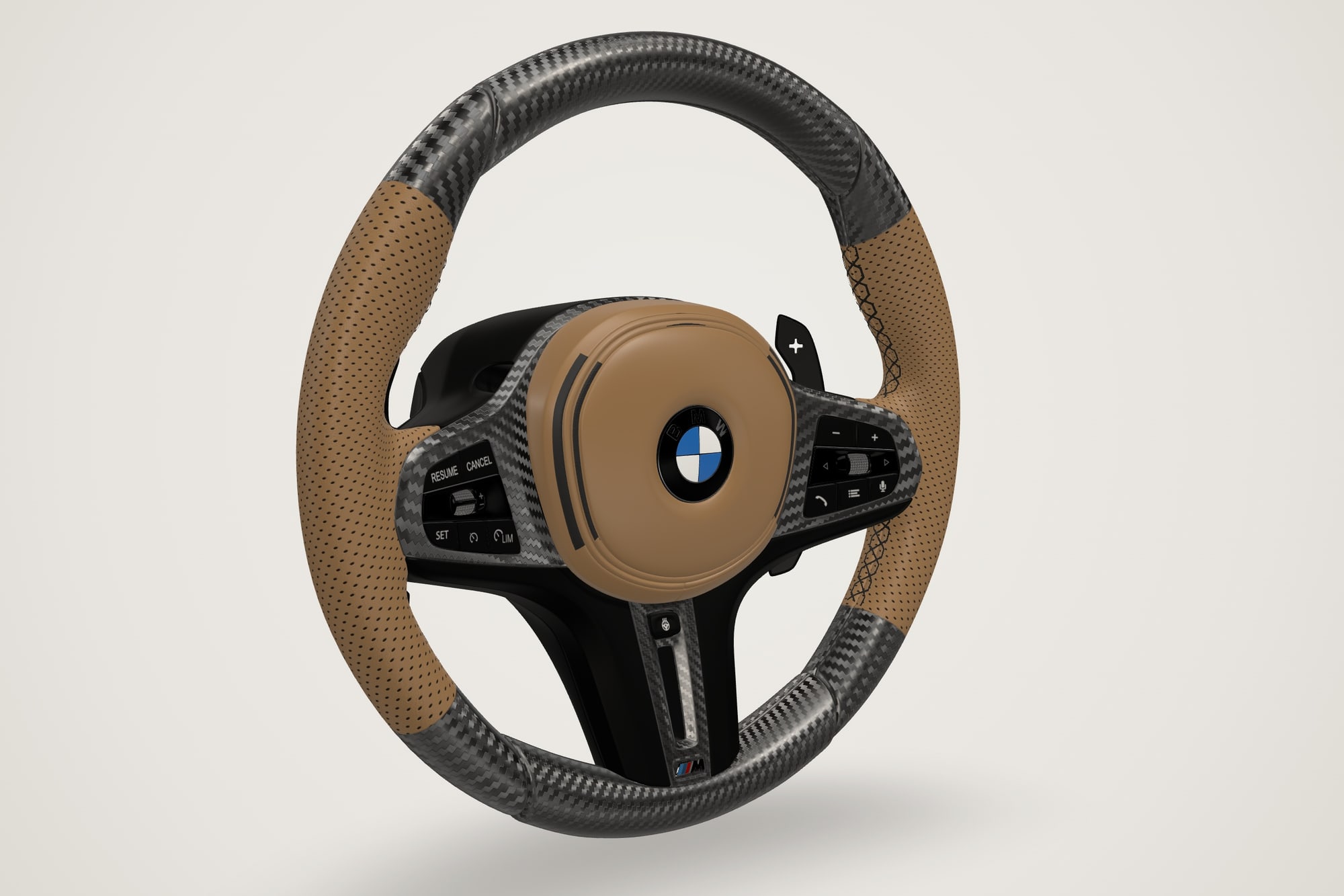 BMW M wheel in tan perforated Nappa with matte 3K carbon and a tan leather airbag cover